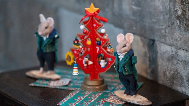 Two felted mic dressed as footmen